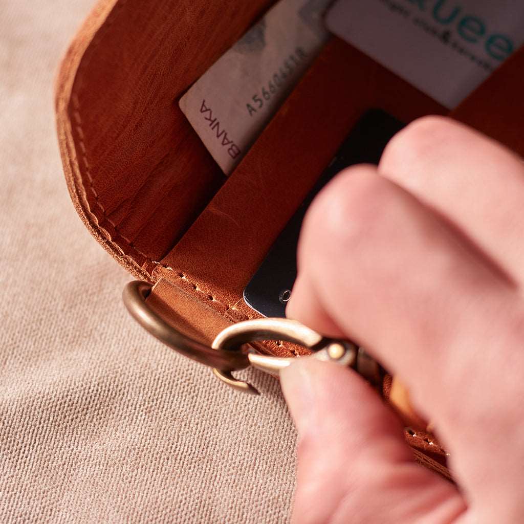 Big Power leather wallet with a hand strap
