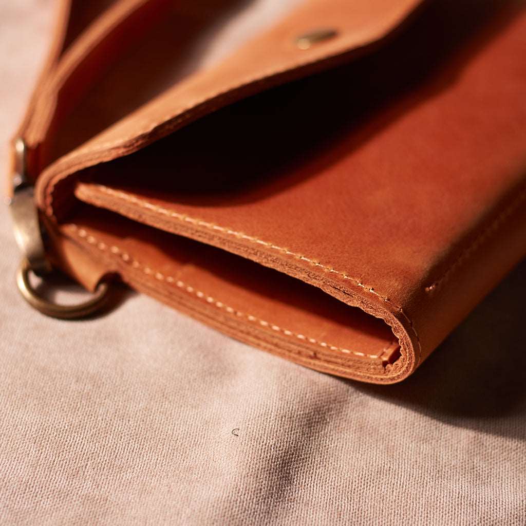 Big Power leather wallet with a hand strap