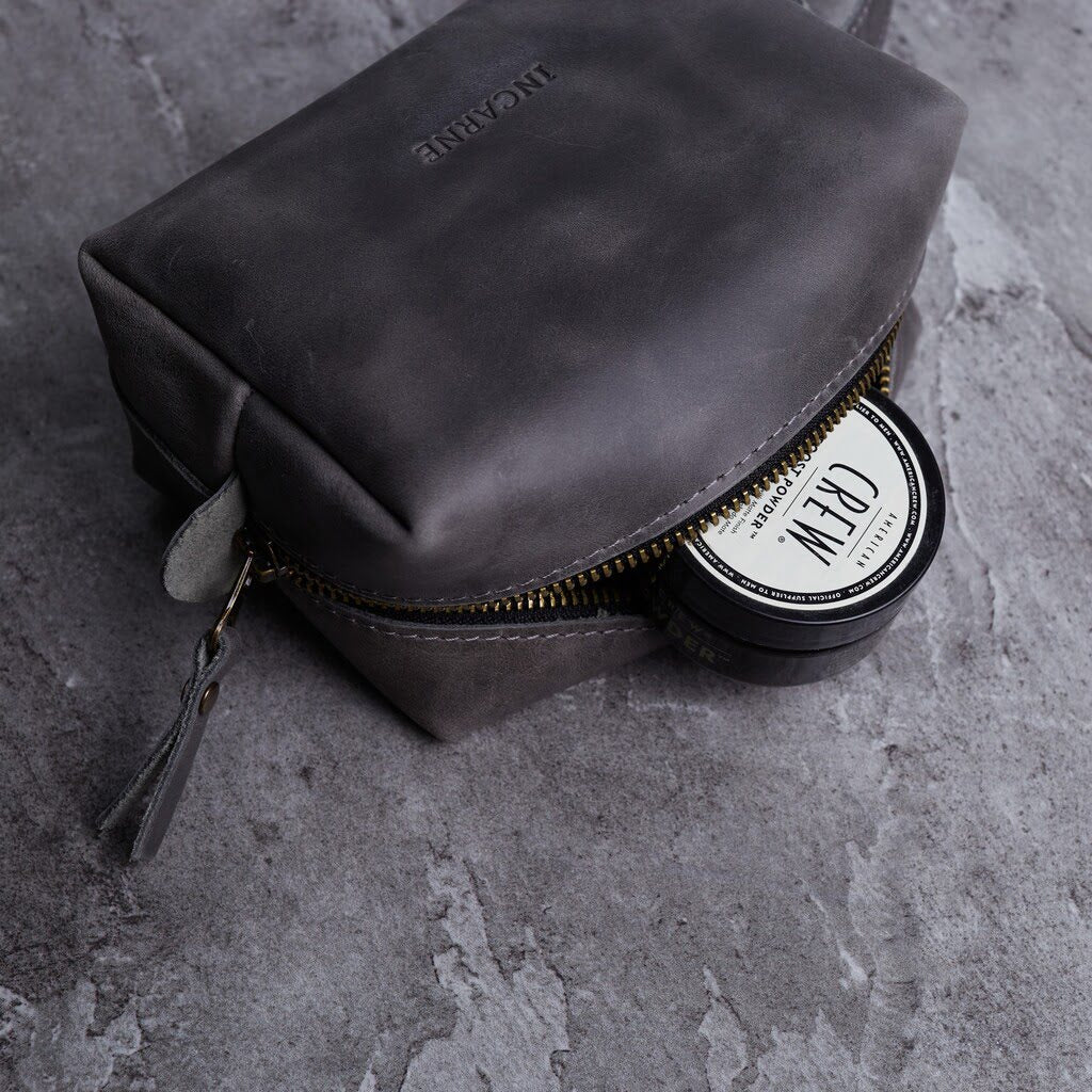 Bolsa cosmética de viaje de cuero a bordo