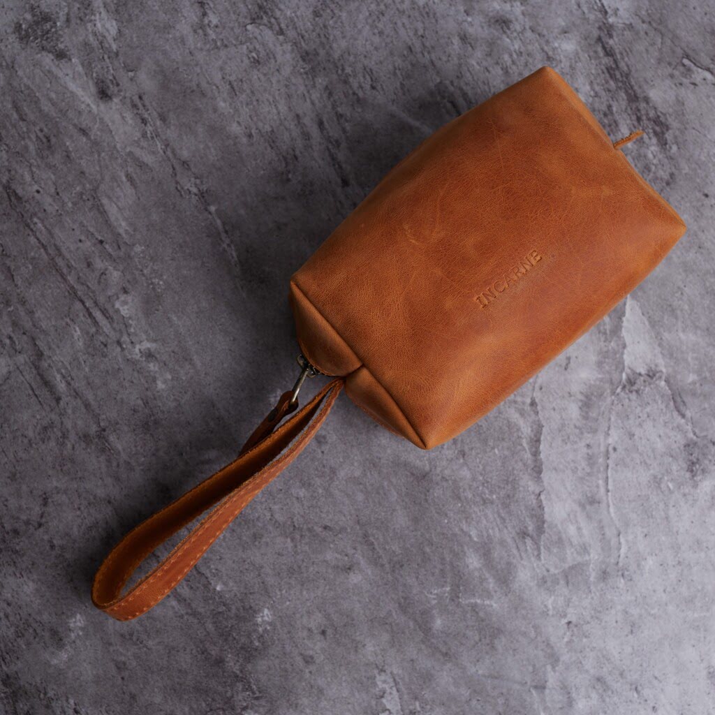 Bolsa cosmética de viaje de cuero a bordo
