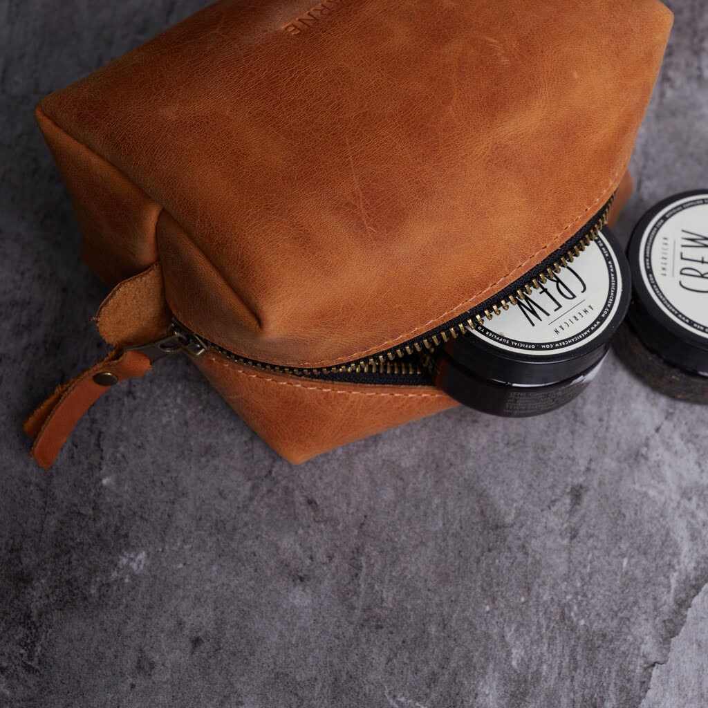 Bolsa cosmética de viaje de cuero a bordo