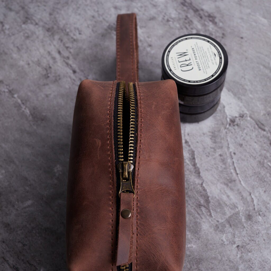 Bolsa cosmética de viaje de cuero a bordo